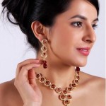 Sharnam Art Gold lacquered necklace with maroon beads decorated with sparkling stones For Women